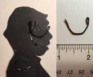 tutorial how to make glasses for shadow puppets Back of the had with wire-made glasses taped to the back