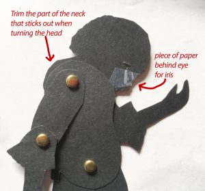 shadow puppet's upper body with brads connecting body parts