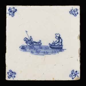 18th century Delft blue tile showing skater and sledder on the ice 