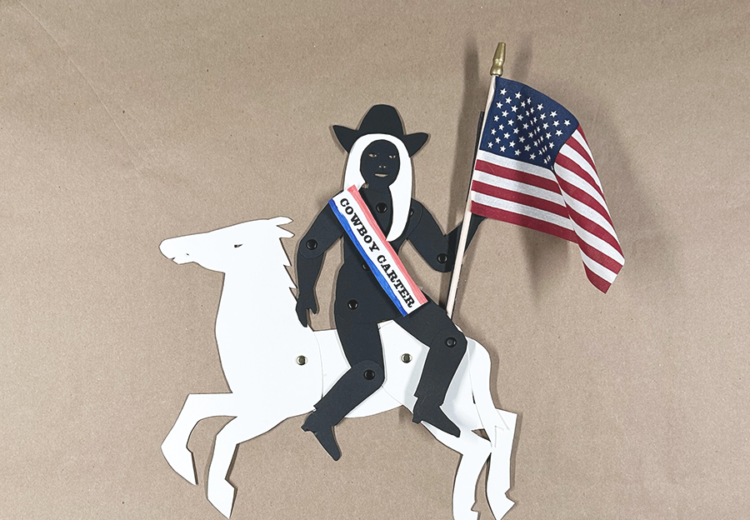 Black silhouette puppet of Beyonce with white hair, flag, and sahs sitting on a white paper horse