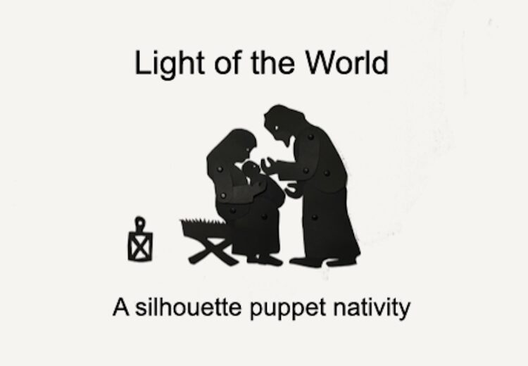 Silhouette or shadow puppets of Mary sitting on the manger holding Jesus while Joseph bends over touching the baby's face